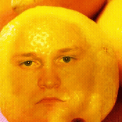 Lemon With Painted Man Face GIF