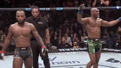 Leon Edwards Arms Up Approaching Camera GIF
