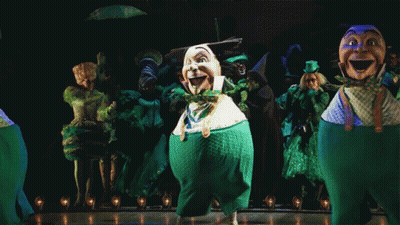 Leprechauns Dancing On Stage GIF