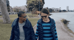 Lesbians Holding Hands Walking In The Park GIF
