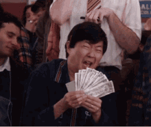 Leslie Chow Having Fun With Money GIF