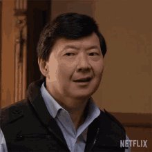 Leslie Chow Slight Smirk GIF