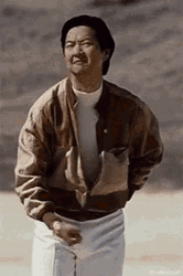 Leslie Chow Throwing Something Gesture GIF