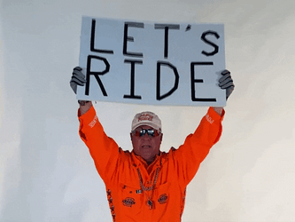 Let's Ride Man Holding A Signboard GIF