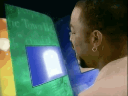 LeVar Burton Reading Rainbow Door On Book GIF