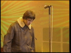 Liam Gallagher Approaching Microphone GIF