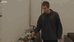 Liam Gallagher Stirring Cup Of Drink GIF