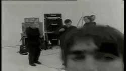 Liam Gallagher Taking A Peek GIF