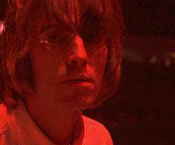 Liam Gallagher With Red Lighting GIF