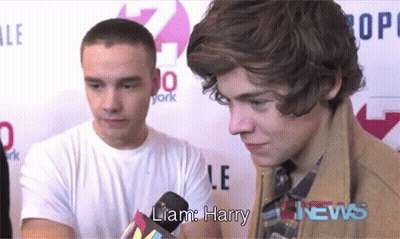 Liam Harry Talking Into Microphone At News GIF