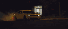 Light Colored Car Drifting In Dark Night GIF