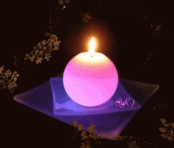 Light Pink Circular Candle Glowing