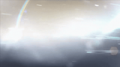 Light Shining Through Cloudy Sky With Rainbow GIF