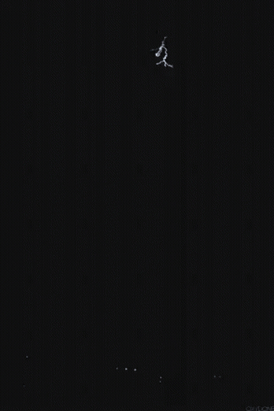 Lightning Bolt Strikes Against Dark Sky GIF