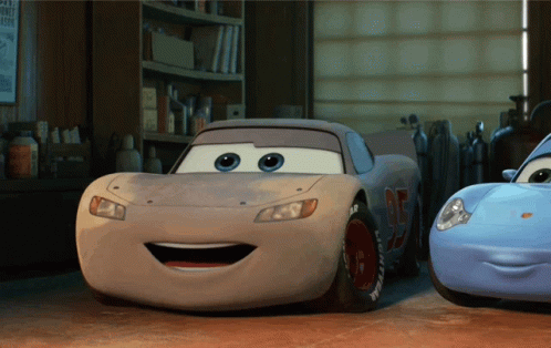 Lightning Mcqueen From The Movie Cars Is Smiling GIF