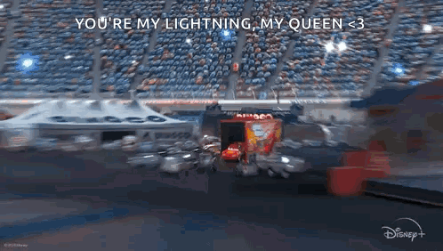 Lightning Mcqueen Is Driving A Race Car On A Race Track In Cars 3 . GIF