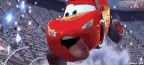 Lightning Mcqueen Is Flying Through The Air With His Tongue Hanging Out . GIF