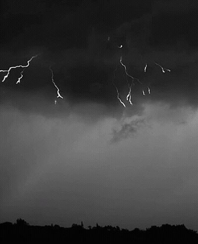 Lightning Strikes Dark Cloudy Sky GIF