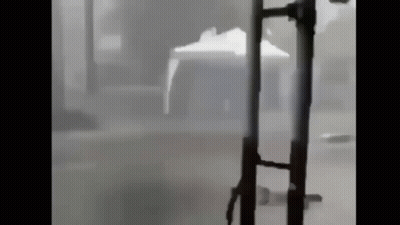 Lightning Strikes Over Ocean At Night GIF