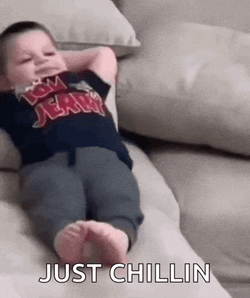 Lil Kid Chilling Chilling On Couch GIF