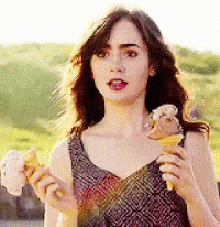 Lily Collins Holding Two Ice Creams GIF