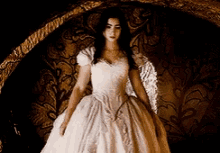Lily Collins In A White Gown GIF