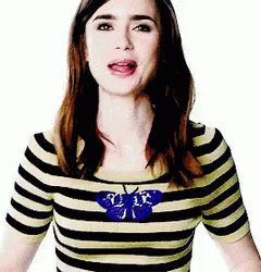 Lily Collins Licking Her Lips GIF