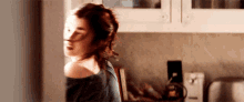 Lily Collins Looking Back While On Call GIF