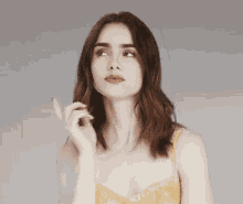 Lily Collins Thinking By Herself GIF