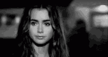 Lily Collins Turning Back And Leaving GIF