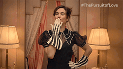 Lily James Flying Kiss GIF