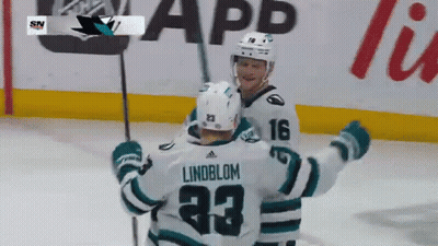 Lindblom #23 Hugging Hockey Player On Ice GIF