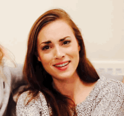 Lip Bite Nodding Head GIF