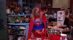 Lisa Kudrow Superman Costume Butt Slap GIF