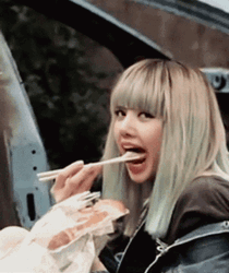 Lisa Of Blackpink Eating With Chopsticks