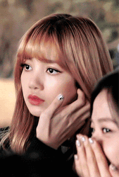 Lisa Of Blackpink Fixing Up Her Hair