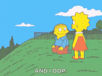 Lisa Simpson Standing Next To Ralph Simpson Laying On Ground GIF