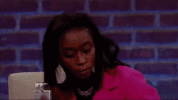Listening Showing Her Earring GIF