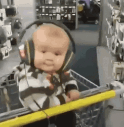 Listening To Music Cute Baby In Cart GIF
