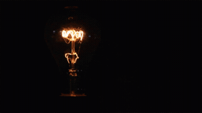 Lit Light Bulb Looks Like Skeleton In Dark GIF