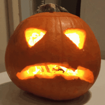 Lit Pumpkin With Carved Face GIF