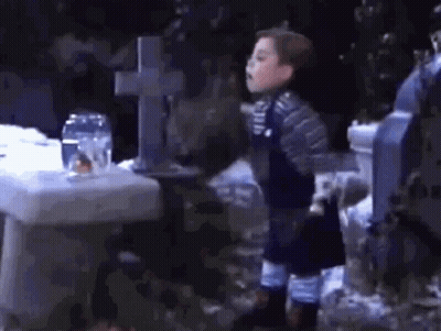 Little Boy At Cemetery GIF