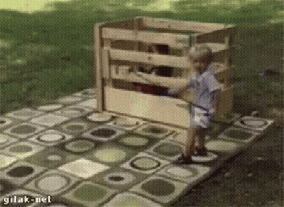 Little Boy Before Wooden Crate Saying Gifak-Net GIF