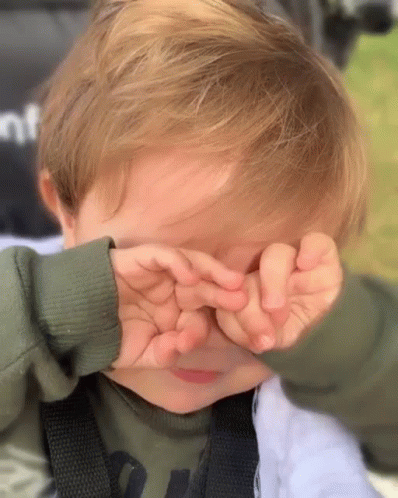 Little Boy Covering Eyes With Hands GIF
