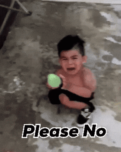 Little Boy Crying Holding Green Ball Saying Please No GIF