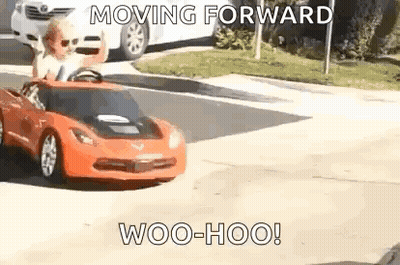 Little Boy Driving Red Toy Car GIF