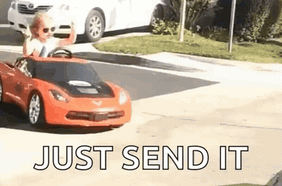 Little Boy Driving Toy Car On Street GIF