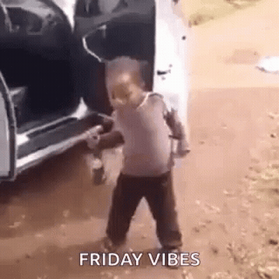 Little Boy Holding Water Bottle In Front Of Car GIF