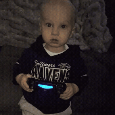 Little Boy In Baltimore Ravens Shirt Holding Video Game Controller GIF