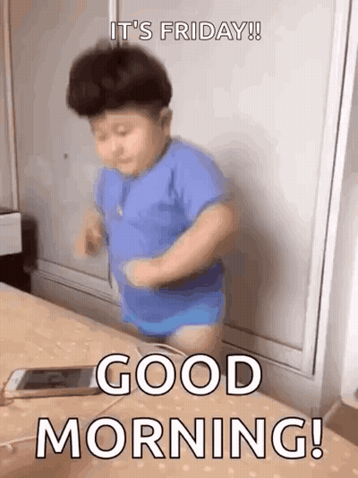Little Boy In Blue Shirt Dancing On Bed With Cell Phone GIF